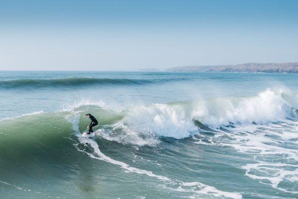 582988-surfing-down-broad-haven-beach